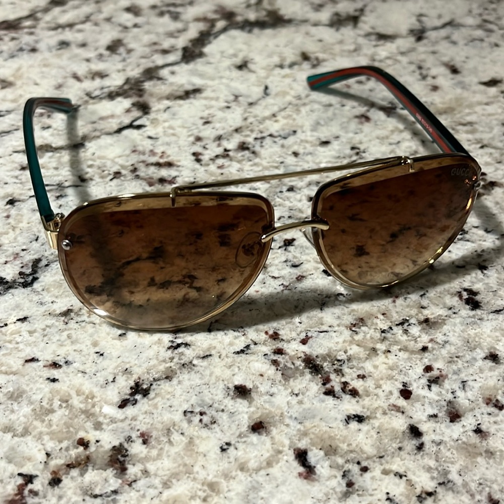 Gucci sunglasses never worn